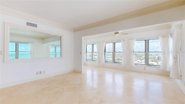 4950 Gulf Blvd Unit 903, St Pete Beach, FL 33706 - unfurnished room featuring a textured ceiling, ornamental molding, and ceiling fan