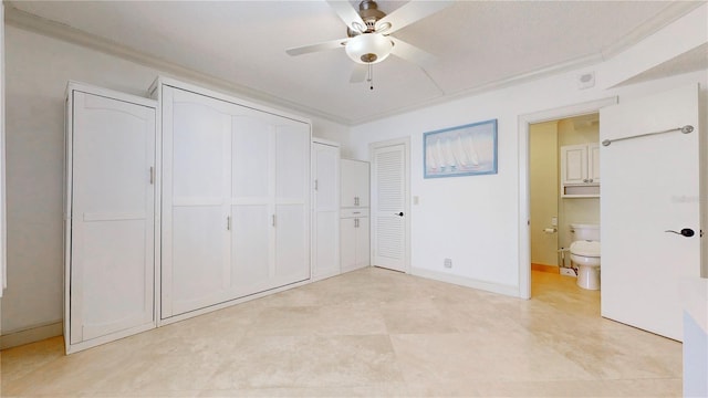 4950 Gulf Blvd Unit 903, St Pete Beach, FL 33706 - unfurnished bedroom featuring crown molding, a closet, a ceiling fan, and ensuite bathroom