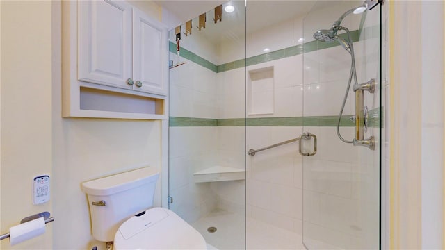 4950 Gulf Blvd Unit 903, St Pete Beach, FL 33706 - bathroom featuring a stall shower and toilet