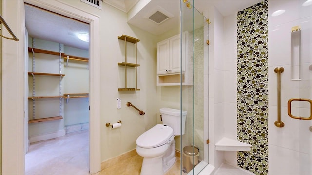 4950 Gulf Blvd Unit 903, St Pete Beach, FL 33706 - full bathroom featuring a stall shower and a spacious closet