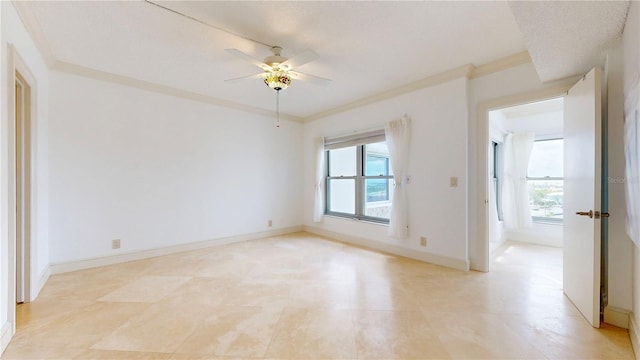 4950 Gulf Blvd Unit 903, St Pete Beach, FL 33706 - spare room featuring crown molding and a ceiling fan