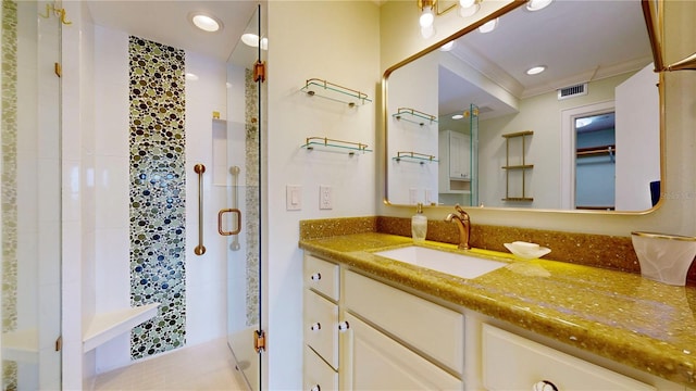4950 Gulf Blvd Unit 903, St Pete Beach, FL 33706 - full bathroom featuring a shower stall, vanity, recessed lighting, and crown molding