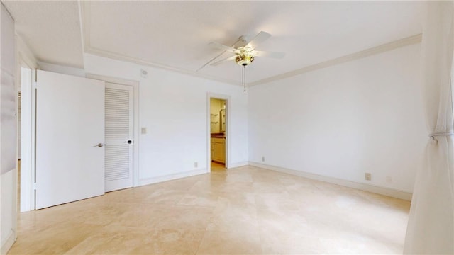 4950 Gulf Blvd Unit 903, St Pete Beach, FL 33706 - unfurnished bedroom featuring ceiling fan, crown molding, a closet, and ensuite bathroom