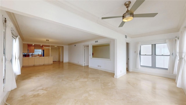 4950 Gulf Blvd Unit 903, St Pete Beach, FL 33706 - unfurnished living room featuring crown molding and a ceiling fan