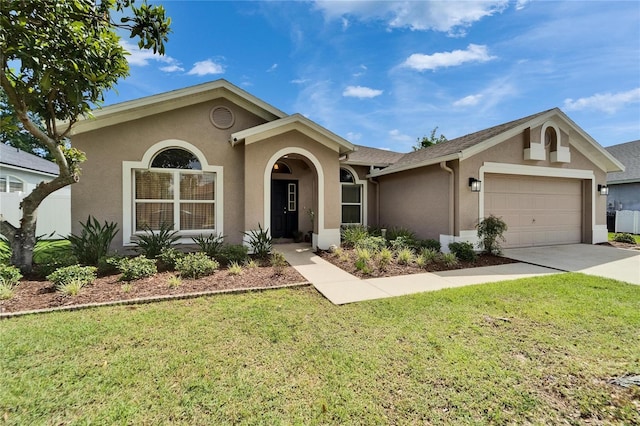 607 Tuscanny St, Brandon, FL 33511 - ranch-style home featuring stucco siding, an attached garage, a front yard, and driveway
