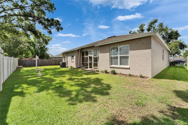 607 Tuscanny St, Brandon, FL 33511 - back of house featuring stucco siding and a fenced backyard