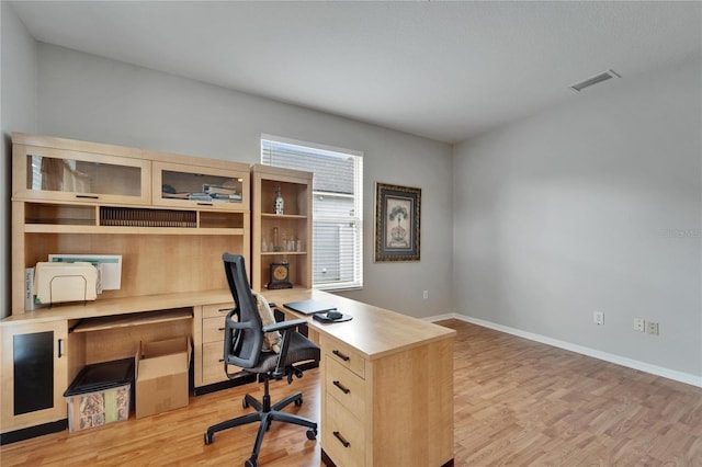 607 Tuscanny St, Brandon, FL 33511 - home office featuring light wood-style floors and baseboards