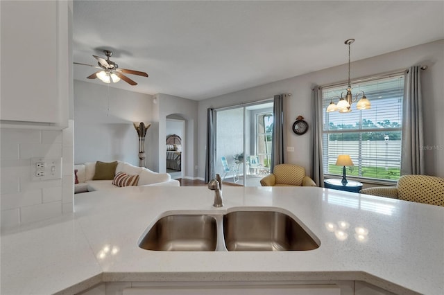 607 Tuscanny St, Brandon, FL 33511 - kitchen featuring open floor plan, healthy amount of natural light, pendant lighting, and a ceiling fan