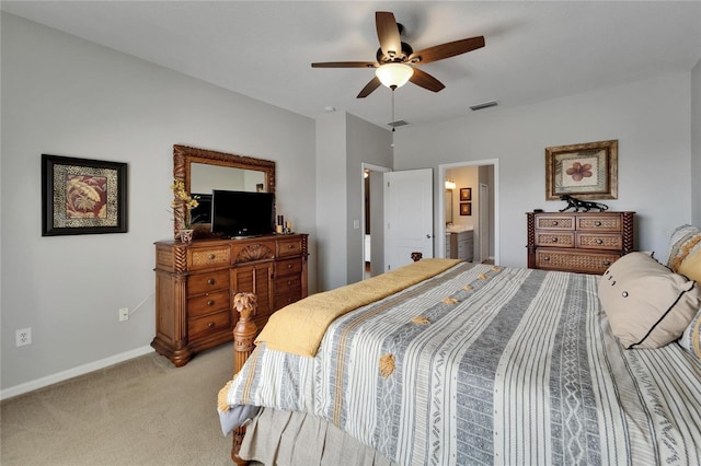 607 Tuscanny St, Brandon, FL 33511 - bedroom with light colored carpet, ceiling fan, and connected bathroom