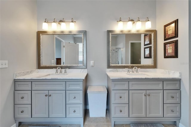 607 Tuscanny St, Brandon, FL 33511 - bathroom featuring two vanities and tile patterned flooring