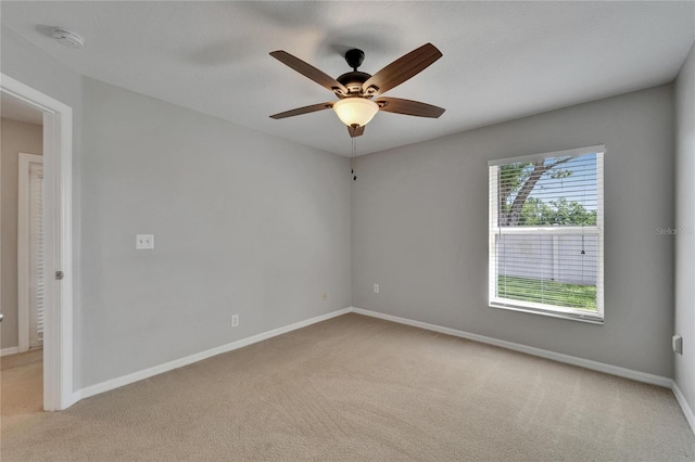 607 Tuscanny St, Brandon, FL 33511 - empty room with light colored carpet, ceiling fan, and a smoke detector