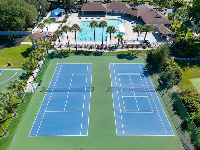 607 Tuscanny St, Brandon, FL 33511 - view of tennis court featuring a community pool