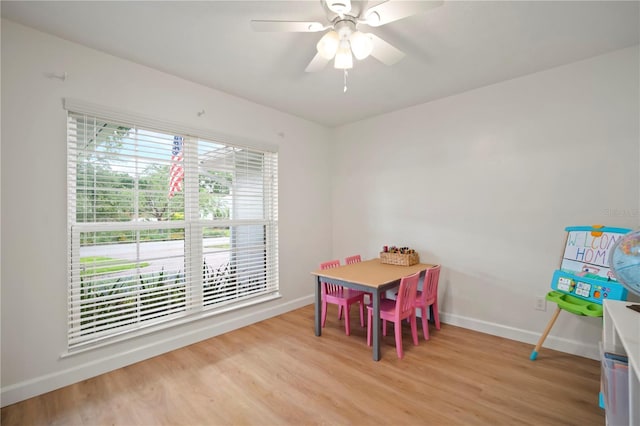 22238 River Rock Dr, Land O Lakes, FL 34639 - recreation room with light wood-style floors and ceiling fan