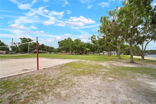 22238 River Rock Dr, Land O Lakes, FL 34639 - view of community with volleyball court and a yard