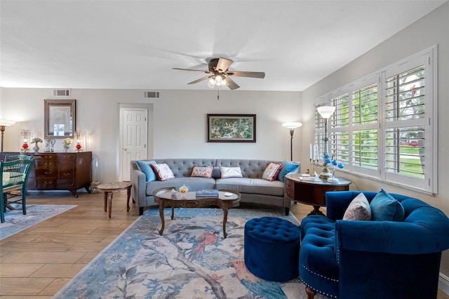 621 77th Ave, St Pete Beach, FL 33706 - living area featuring ceiling fan and wood finished floors