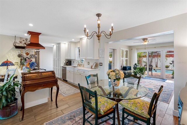 621 77th Ave, St Pete Beach, FL 33706 - dining room with light wood-style floors, a chandelier, a ceiling fan, and recessed lighting