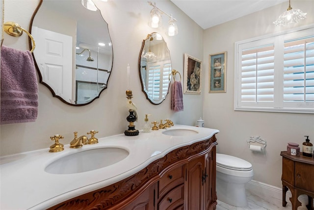 621 77th Ave, St Pete Beach, FL 33706 - full bathroom with double vanity, a shower, and marble finish floors