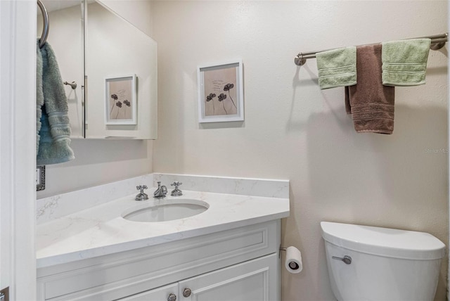 621 77th Ave, St Pete Beach, FL 33706 - bathroom with vanity and toilet