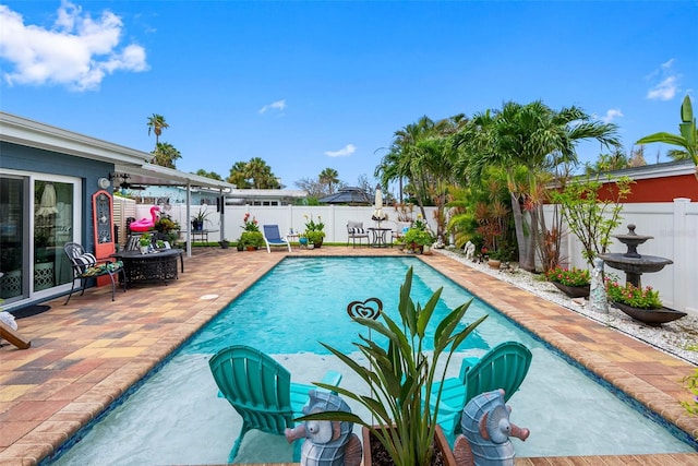 621 77th Ave, St Pete Beach, FL 33706 - view of pool featuring a patio and a fenced backyard