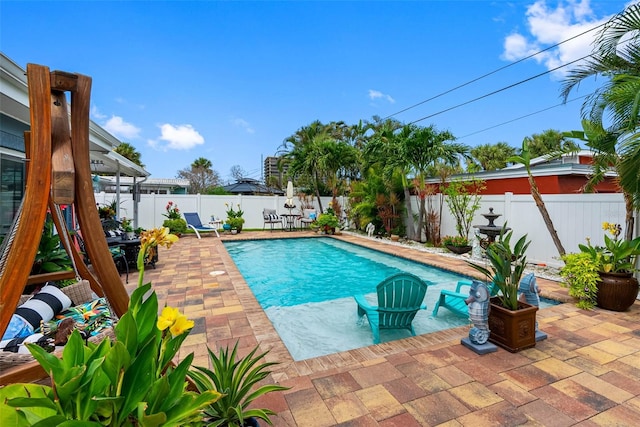 621 77th Ave, St Pete Beach, FL 33706 - view of swimming pool with a patio area and a fenced backyard