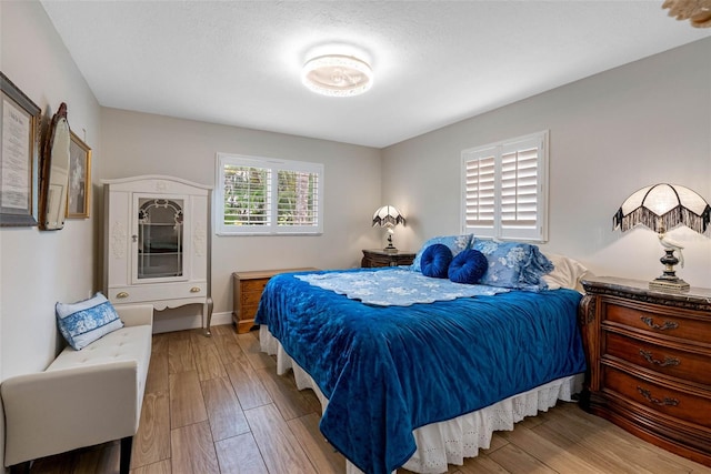 621 77th Ave, St Pete Beach, FL 33706 - bedroom featuring wood finished floors