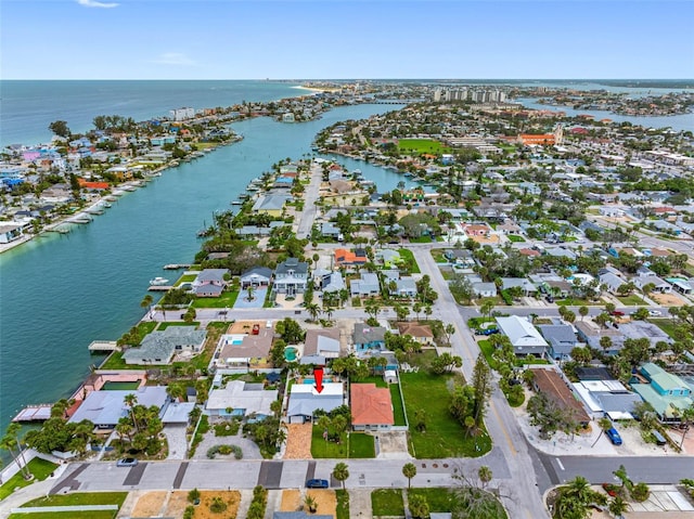 621 77th Ave, St Pete Beach, FL 33706 - aerial view of property and surrounding area with a large body of water and nearby suburban area