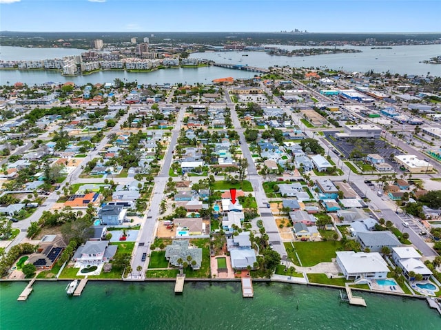 621 77th Ave, St Pete Beach, FL 33706 - aerial overview of property's location featuring a nearby body of water and nearby suburban area