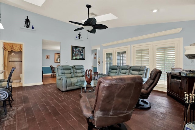 101 Carlyle Dr, Palm Harbor, FL 34683 - living area with a skylight, a ceiling fan, dark wood-type flooring, and high vaulted ceiling