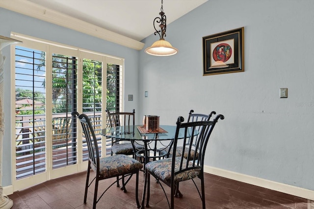 101 Carlyle Dr, Palm Harbor, FL 34683 - dining area featuring lofted ceiling and dark wood finished floors