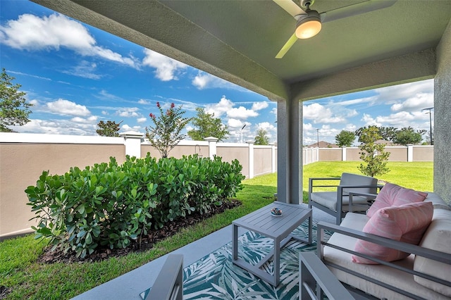 31530 Magna Gulf Loop, San Antonio, FL 33576 - fenced backyard featuring a ceiling fan and a patio