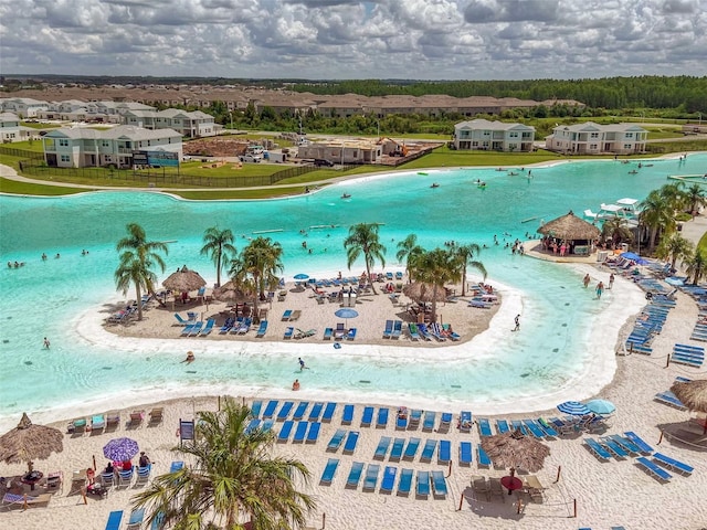 31530 Magna Gulf Loop, San Antonio, FL 33576 - bird's eye view of waterfront with a beach