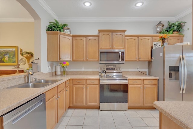 8251 118th Ave Unit 8251, Largo, FL 33773 - kitchen with appliances with stainless steel finishes, light tile patterned flooring, light countertops, arched walkways, and crown molding