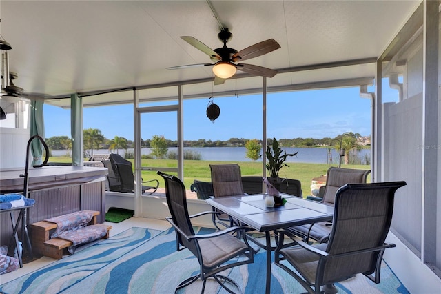 8251 118th Ave Unit 8251, Largo, FL 33773 - sunroom / solarium with a ceiling fan, a hot tub, a water view, and healthy amount of natural light