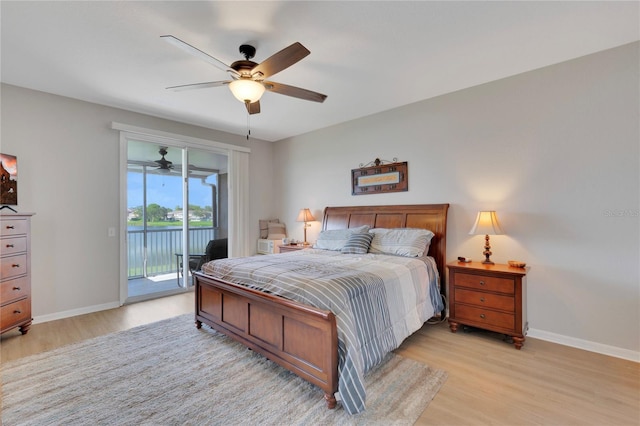 8251 118th Ave Unit 8251, Largo, FL 33773 - bedroom featuring light wood-style flooring, access to outside, and ceiling fan