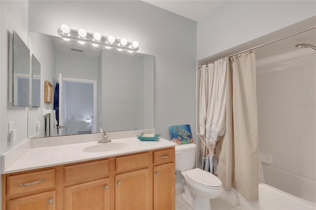 8251 118th Ave Unit 8251, Largo, FL 33773 - full bathroom featuring vanity, shower / bath combo with shower curtain, and tile patterned flooring