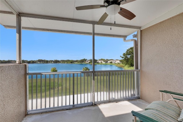 8251 118th Ave Unit 8251, Largo, FL 33773 - sunroom featuring a water view and a ceiling fan
