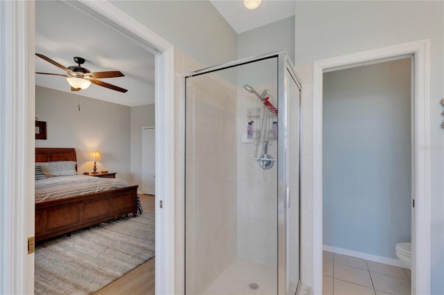 8251 118th Ave Unit 8251, Largo, FL 33773 - full bathroom featuring ensuite bath, a stall shower, and ceiling fan