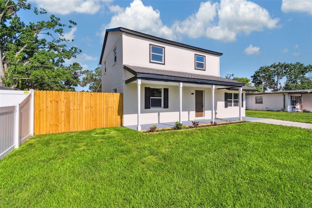 7806 N Matanzas Ave, Tampa, FL 33614 - view of front of home featuring stucco siding, roof with shingles, and covered porch