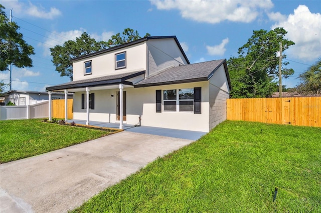 7806 N Matanzas Ave, Tampa, FL 33614 - view of front of house with a shingled roof, covered porch, stucco siding, and driveway