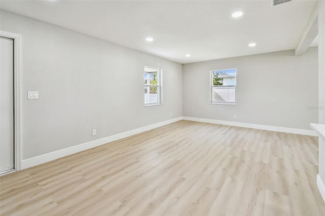 7806 N Matanzas Ave, Tampa, FL 33614 - unfurnished room with healthy amount of natural light, recessed lighting, and light wood-type flooring