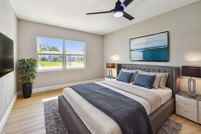 7806 N Matanzas Ave, Tampa, FL 33614 - bedroom with light wood finished floors and ceiling fan