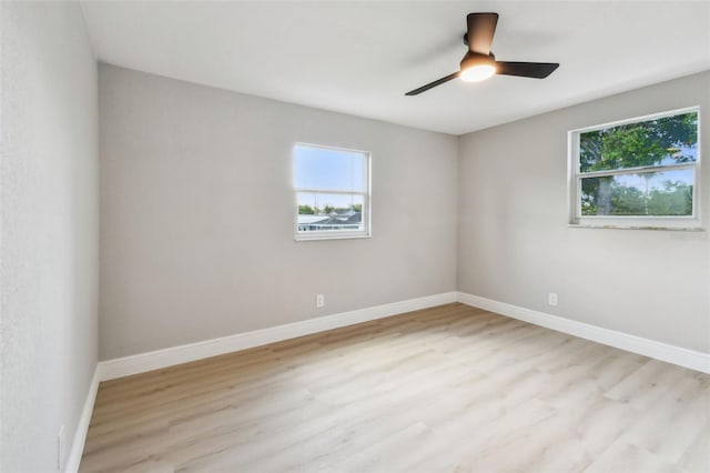 7806 N Matanzas Ave, Tampa, FL 33614 - spare room featuring wood finished floors and a ceiling fan