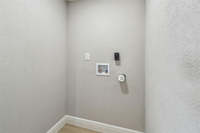 7806 N Matanzas Ave, Tampa, FL 33614 - laundry room featuring washer hookup and baseboards
