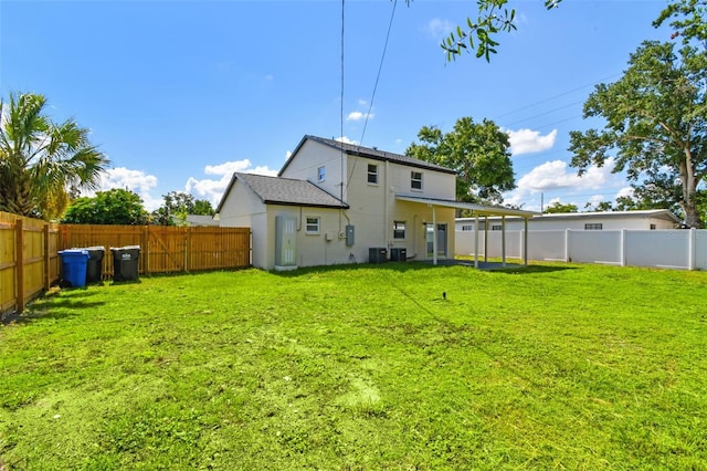 7806 N Matanzas Ave, Tampa, FL 33614 - back of property featuring a fenced backyard