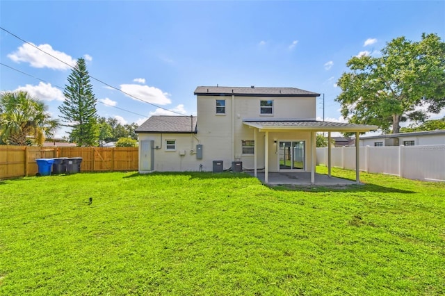 7806 N Matanzas Ave, Tampa, FL 33614 - back of property featuring a patio area and a fenced backyard