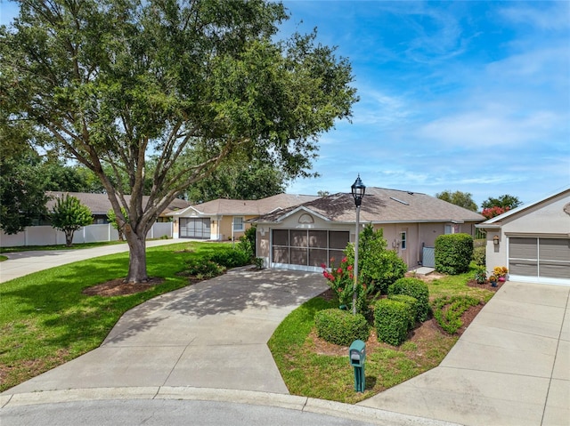 1760 W Shanelle Path, Lecanto, FL 34461 - ranch-style house with driveway and a front lawn