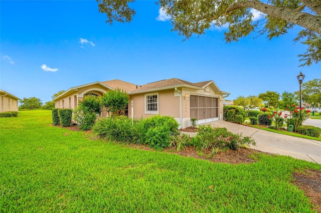 1760 W Shanelle Path, Lecanto, FL 34461 - view of front of house with stucco siding, a front yard, driveway, and an attached garage