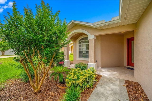 1760 W Shanelle Path, Lecanto, FL 34461 - view of exterior entry featuring stucco siding