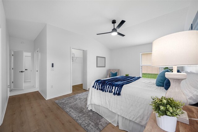 1760 W Shanelle Path, Lecanto, FL 34461 - bedroom with lofted ceiling, wood finished floors, ceiling fan, and a spacious closet