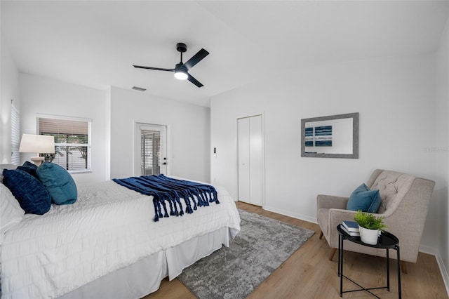 1760 W Shanelle Path, Lecanto, FL 34461 - bedroom with wood finished floors, a ceiling fan, and a closet